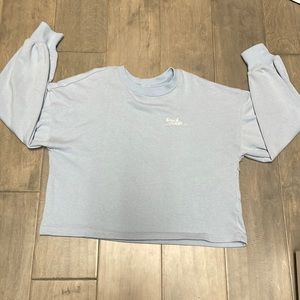 Light blue “beach mode” long sleeve shirt/sweater and shorts